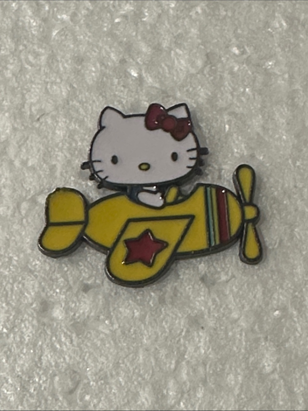 Sanrio Hello Kitty Yellow Airplane Pin with Red Bow